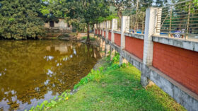 রাস্তা ভেঙ্গে পুকুরে বিলীন: কমিউনিটি ক্লিনিকে যেতে পারছেনা রোগিরা